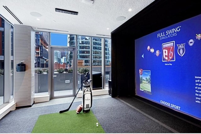 133 Seaport Blvd Unit 0920, Boston, MA 02210 - playroom featuring expansive windows, a textured ceiling, and golf simulator