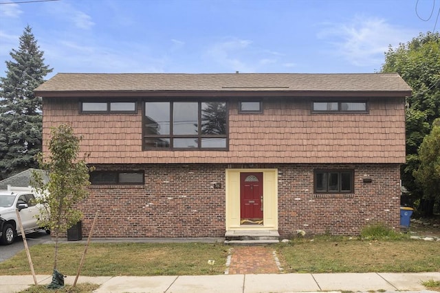 view of front of home with a front yard