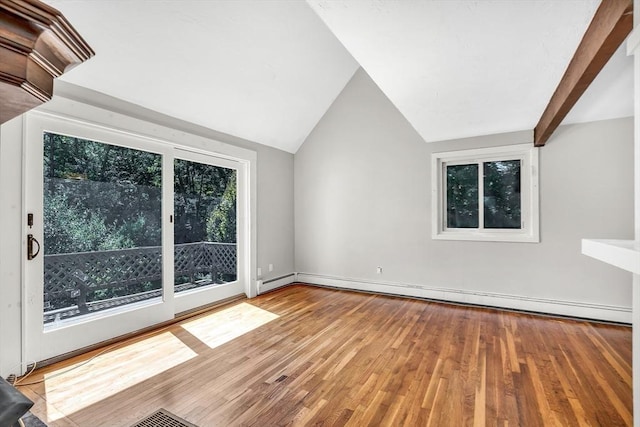 2 Clover Hill Rd, Acton, MA 01720 - bonus room featuring a baseboard radiator, wood finished floors, and vaulted ceiling
