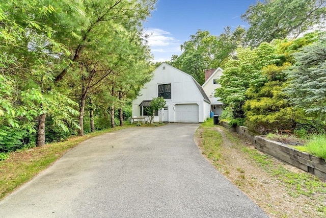 2 Clover Hill Rd, Acton, MA 01720 - view of side of home featuring driveway, a barn, an outdoor structure, and a gambrel roof