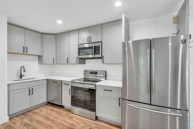 2 Clover Hill Rd, Acton, MA 01720 - kitchen with stainless steel appliances, gray cabinets, and recessed lighting