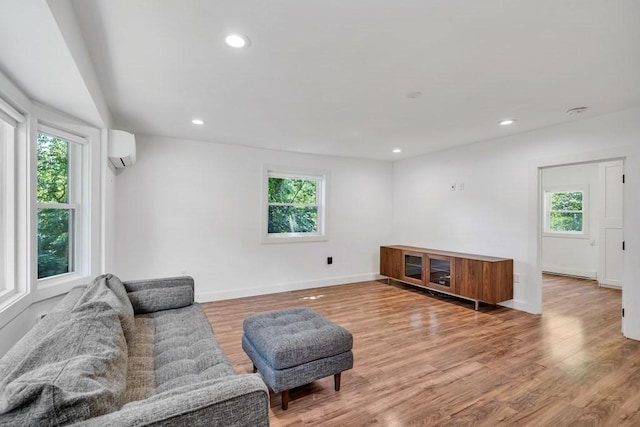 2 Clover Hill Rd, Acton, MA 01720 - sitting room featuring a wall mounted AC, light wood-style flooring, and recessed lighting