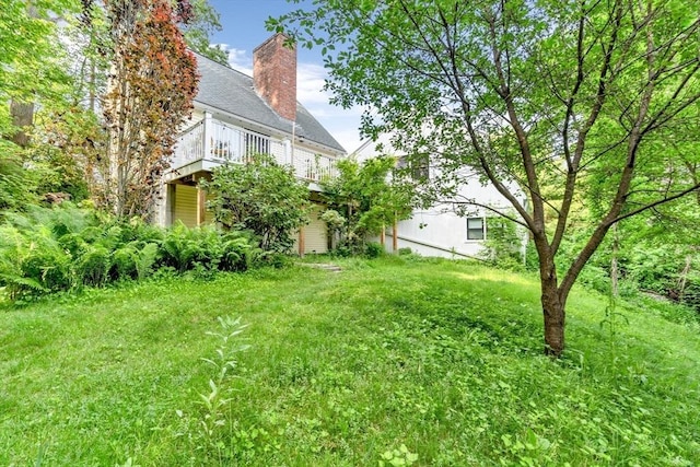 2 Clover Hill Rd, Acton, MA 01720 - view of green lawn featuring a deck