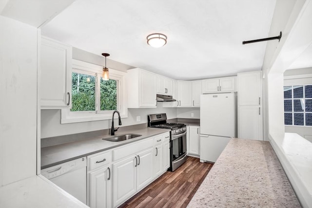 2 Clover Hill Rd, Acton, MA 01720 - kitchen with white appliances, under cabinet range hood, white cabinets, and dark wood-type flooring