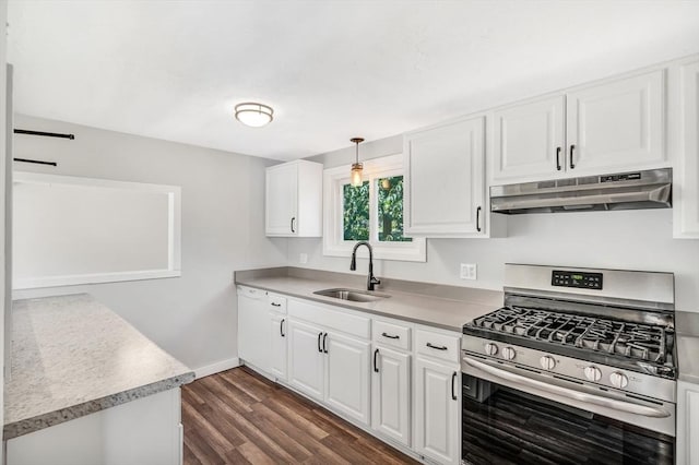 2 Clover Hill Rd, Acton, MA 01720 - kitchen with stainless steel range with gas stovetop, under cabinet range hood, white cabinetry, and dark wood-style flooring