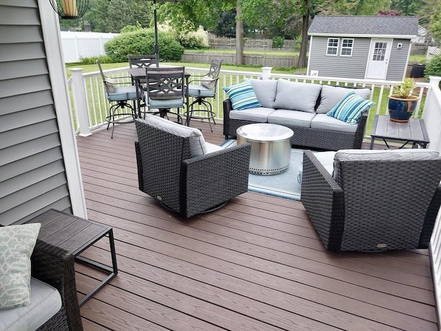 214 Fisher St, Walpole, MA 02081 - wooden terrace featuring outdoor dining space, an outdoor living space, and a shed
