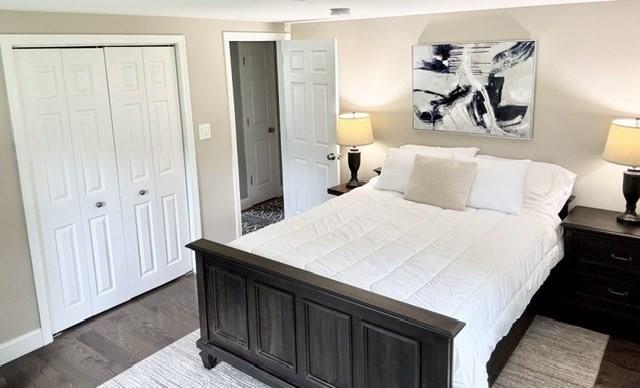 214 Fisher St, Walpole, MA 02081 - bedroom with wood finished floors and a closet