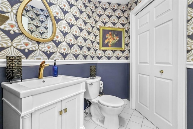 10 Highcroft Way Unit 10, Hopkinton, MA 01748 - bathroom featuring wallpapered walls, baseboards, toilet, vanity, and tile patterned floors