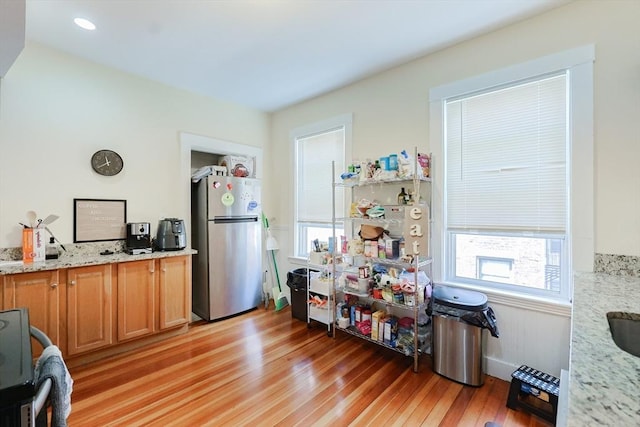39 Chester St, Boston, MA 02134 - office area with light wood-style flooring and healthy amount of natural light
