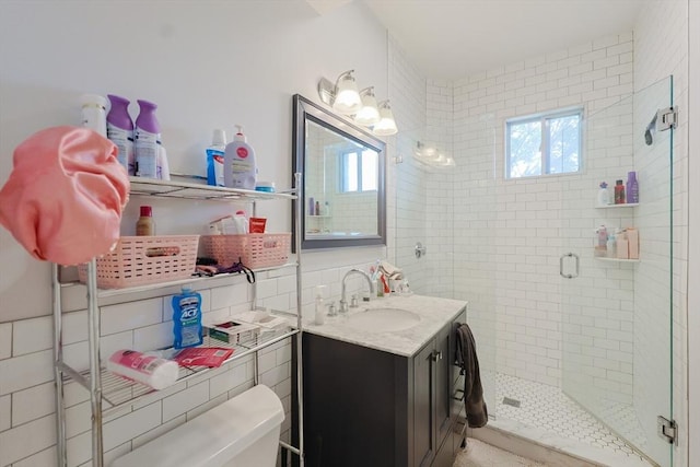 39 Chester St, Boston, MA 02134 - full bathroom featuring vanity, a stall shower, plenty of natural light, and toilet
