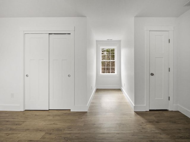 entrance foyer with dark hardwood / wood-style flooring