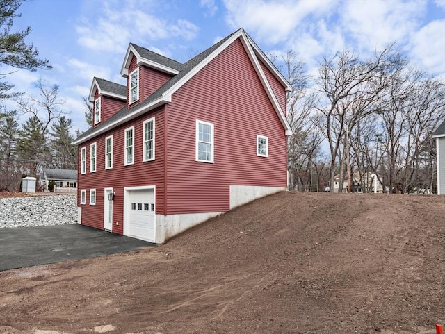 view of home's exterior featuring a garage