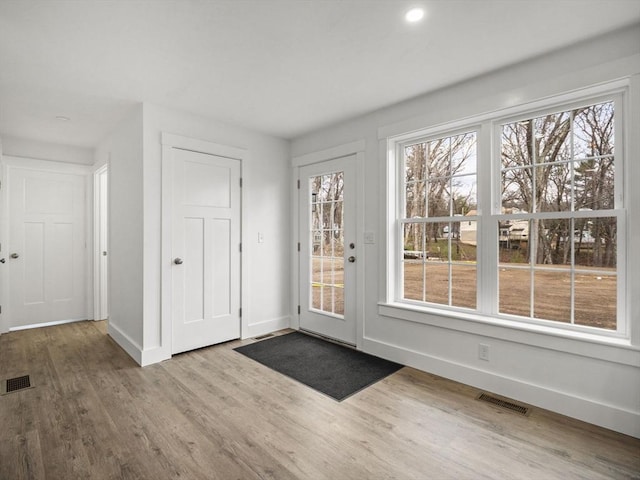 foyer featuring hardwood / wood-style floors