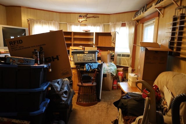 misc room with cooling unit, crown molding, and wood walls