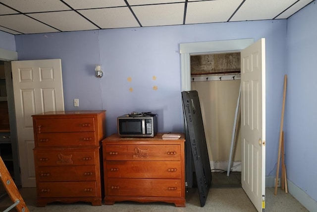 bedroom with a paneled ceiling