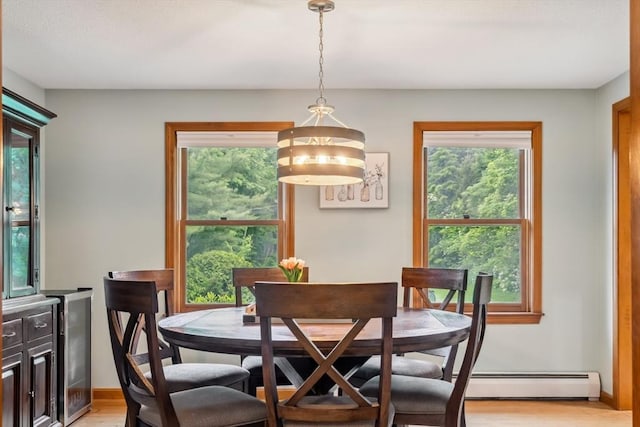 32 Berkeley, Pelham, NH 03076 - dining room featuring a baseboard radiator, light wood finished floors, and beverage cooler