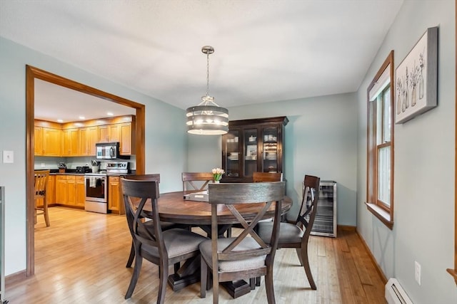 32 Berkeley, Pelham, NH 03076 - dining room with light wood-style flooring, baseboard heating, a chandelier, and recessed lighting