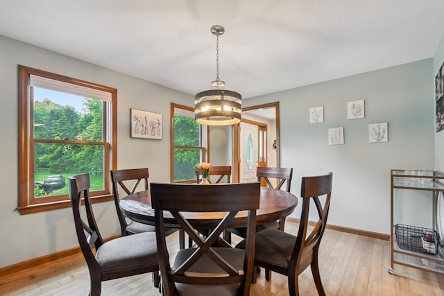 32 Berkeley, Pelham, NH 03076 - dining room with a chandelier and light wood finished floors