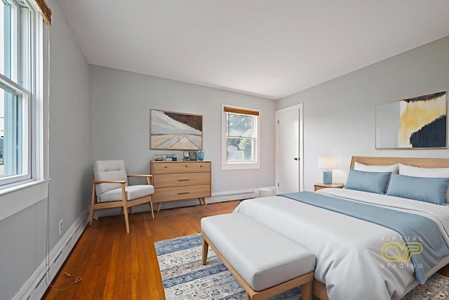 13 Meadow Ln, Acushnet, MA 02743 - bedroom with wood-type flooring and a baseboard heating unit