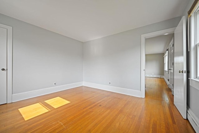 13 Meadow Ln, Acushnet, MA 02743 - spare room with light wood-type flooring, a baseboard radiator, and baseboard heating