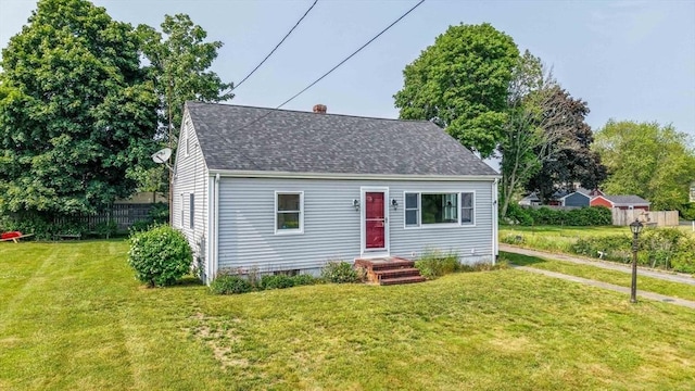 13 Meadow Ln, Acushnet, MA 02743 - cape cod house featuring roof with shingles and a chimney