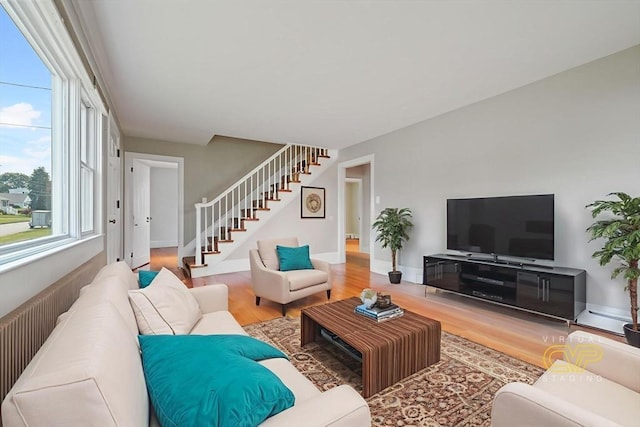 13 Meadow Ln, Acushnet, MA 02743 - living area with stairs and wood finished floors