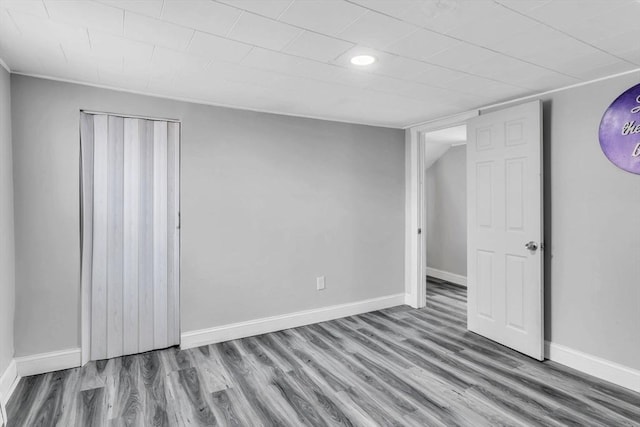 empty room featuring hardwood / wood-style flooring