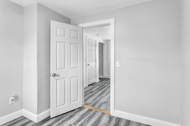 empty room featuring hardwood / wood-style floors