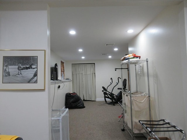 workout room with light carpet