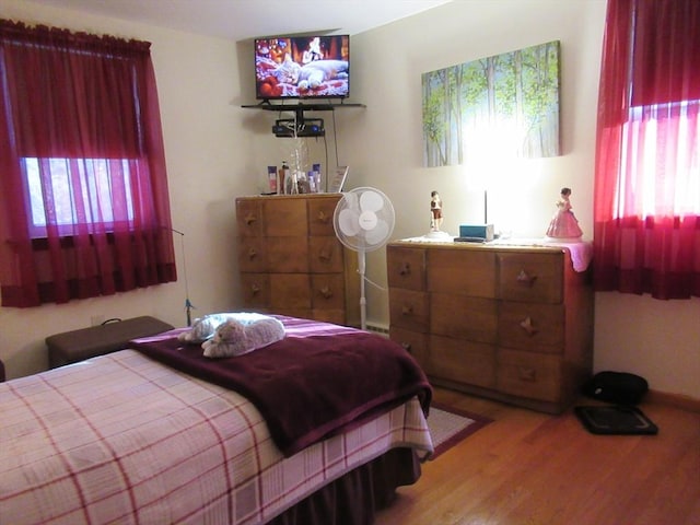 bedroom featuring hardwood / wood-style floors