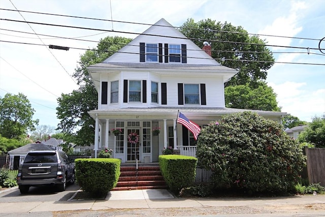 27 Summer St, Saugus, MA 01906 - traditional style home with covered porch and a chimney