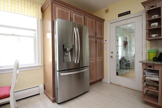 27 Summer St, Saugus, MA 01906 - kitchen with stainless steel refrigerator with ice dispenser, open shelves, a baseboard radiator, baseboards, and stone countertops