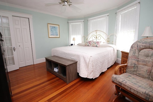 27 Summer St, Saugus, MA 01906 - bedroom featuring wood finished floors, ornamental molding, baseboards, and ceiling fan