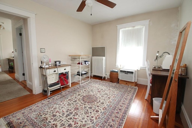 27 Summer St, Saugus, MA 01906 - office space with radiator, ceiling fan, wood finished floors, and a wall unit AC