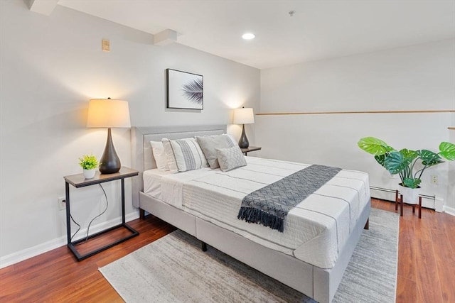 bedroom featuring hardwood / wood-style floors