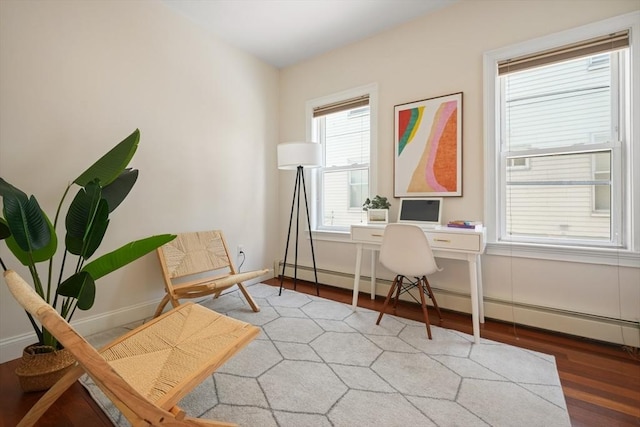 297 Cardinal Medeiros Ave Unit 1, Cambridge, MA 02141 - office space featuring light wood finished floors, a baseboard radiator, and baseboards