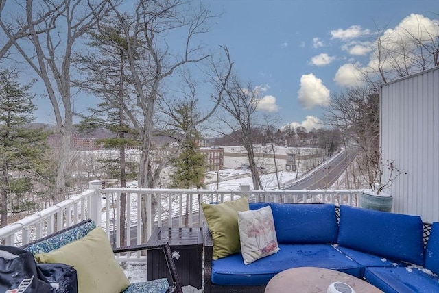 view of snow covered deck