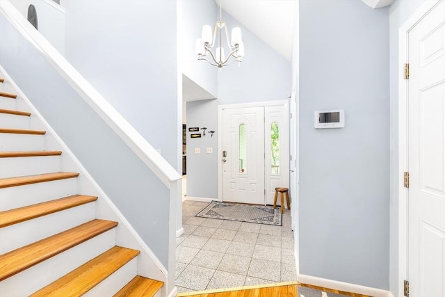 61 Northbridge Rd, Mendon, MA 01756 - entrance foyer featuring baseboards, a chandelier, stairway, high vaulted ceiling, and granite floors