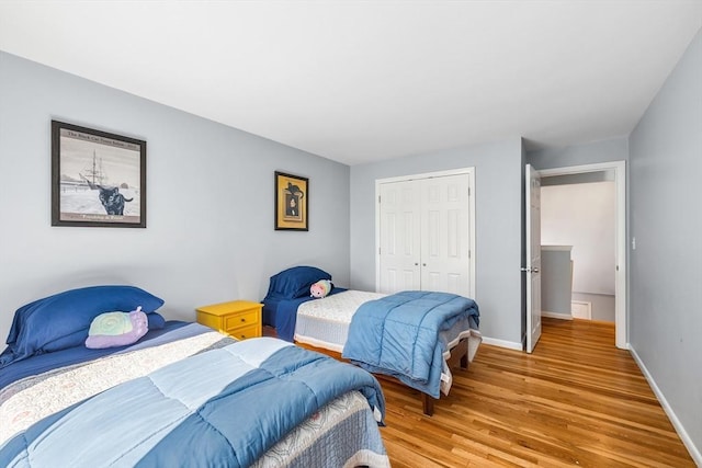 61 Northbridge Rd, Mendon, MA 01756 - bedroom featuring light wood finished floors, a closet, and baseboards