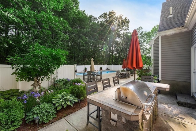 61 Northbridge Rd, Mendon, MA 01756 - fenced backyard featuring outdoor dining area and a patio