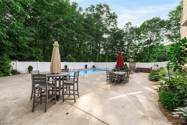 61 Northbridge Rd, Mendon, MA 01756 - fenced backyard featuring outdoor dining space, a patio area, and view of scattered trees