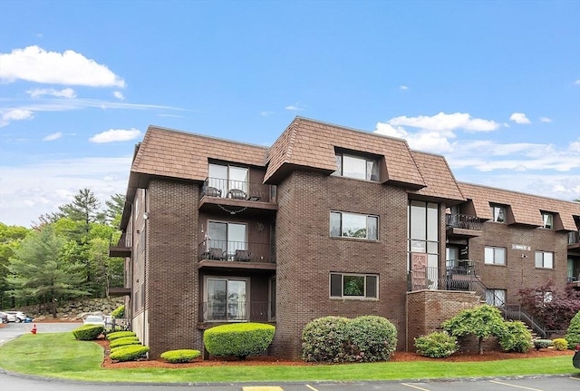 5 Thomas St Unit P17, Saugus, MA 01906 - view of apartment building / complex featuring uncovered parking