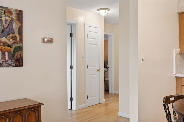 5 Thomas St Unit P17, Saugus, MA 01906 - hallway featuring light wood-style flooring and baseboards