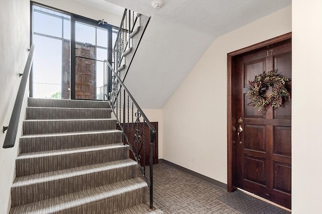 5 Thomas St Unit P17, Saugus, MA 01906 - stairs featuring carpet, lofted ceiling, and healthy amount of natural light