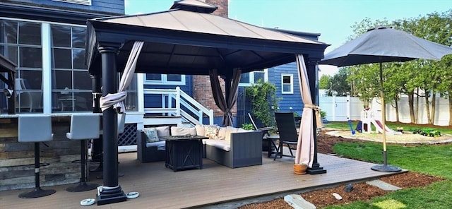 deck with fence and a gazebo