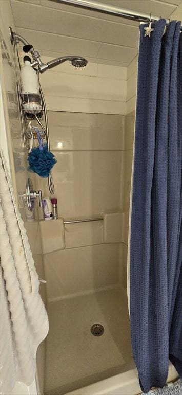 full bathroom with a shower stall