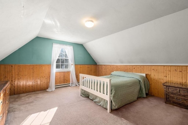 carpeted bedroom featuring wooden walls and vaulted ceiling