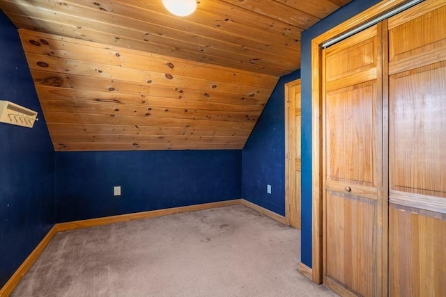 bonus room featuring lofted ceiling, light colored carpet, and wooden ceiling