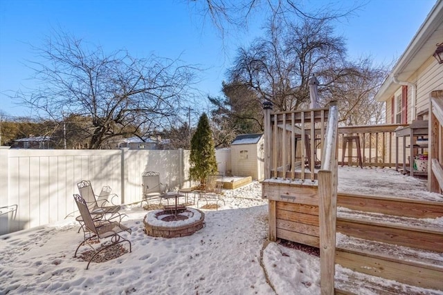 exterior space featuring an outdoor fire pit