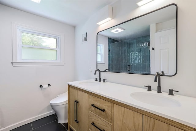 128 Clinton St, Hopkinton, MA 01748 - full bath with toilet, tile patterned flooring, healthy amount of natural light, and double vanity